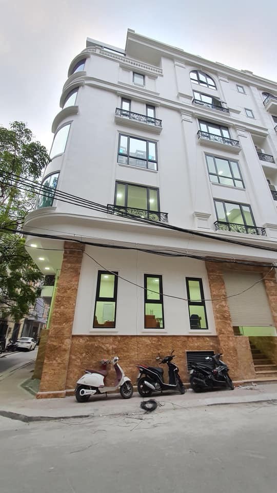 Bán toà Văn Phòng Trung Kính 90M2 x 7 tầng, MT 6m, thuê 100tr/th, lô góc, ô tô, tháng máy.