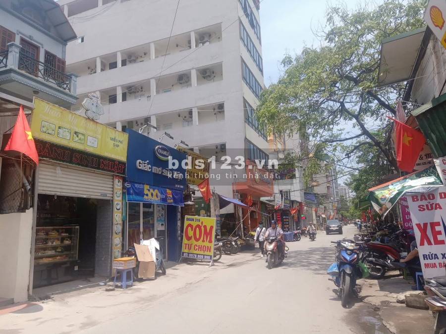 Bán gấp! nhà mặt đường Mỹ Đình 124m2 x 4 tầng, lô góc, ô tô, kinh doanh, 24 tỷ.