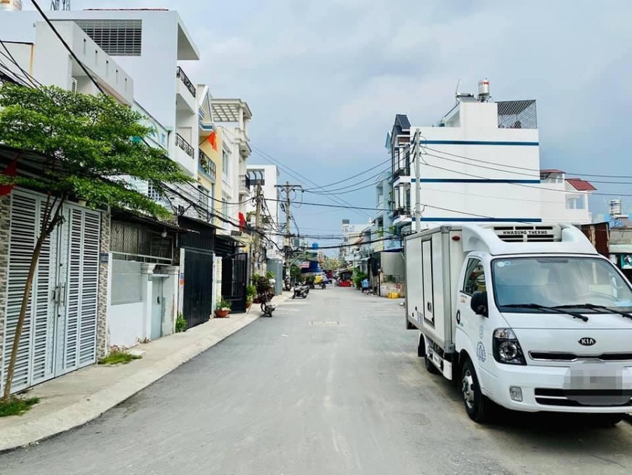 Bán gấp tòa nhà 4 tầng mặt tiền Hòa Bình Tân Phú 100m2 mới nhất 0936444869