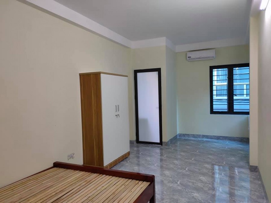 Bán chung cư mini xây mới 70m, 7 tầng, MT gần 6.7m, 18 phòng, thang máy, phố Triều Khúc, chào giá 10.8 tỷ
