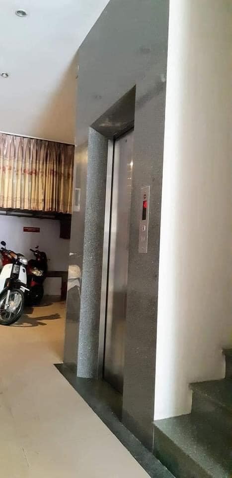 Bán nhà Nguyễn Khang 130m2 x 8 tầng, MT 7m, KD 170tr/th. Ô tô tránh, thang máy.