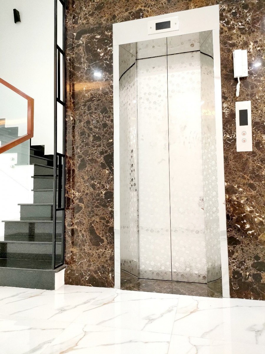 Nhà mặt tiền đường số Tân Quy 5x20m hầm trệt 3 lầu sân thượng 14tỷ2.