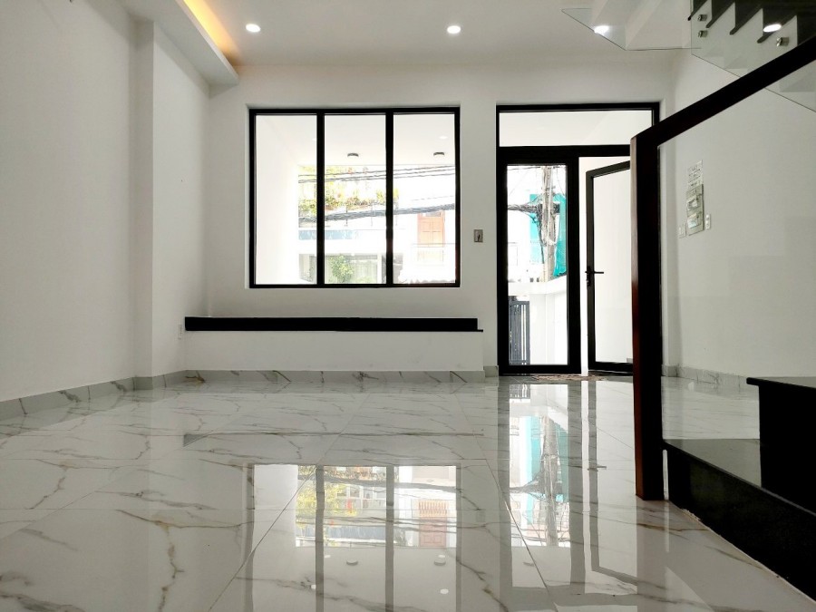 Nhà mặt tiền đường số Tân Quy 5x20m hầm trệt 3 lầu sân thượng 14tỷ2.