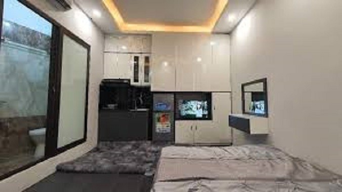 Bán nhà Thịnh Quang, Đống Đa 100m2, 7 tầng thang máy, 22P, doanh thu 100 triệu/ tháng, giá 13 tỷ (thương lượng)