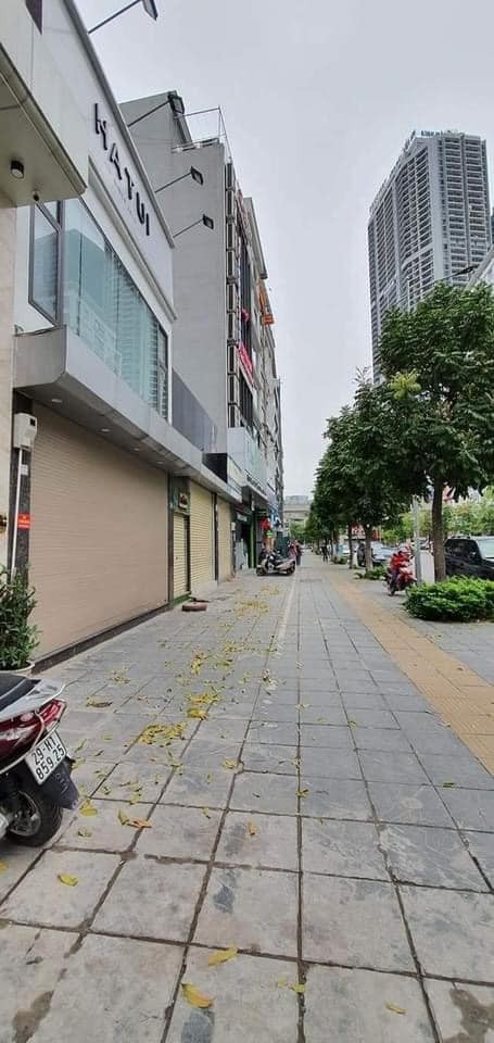 Bán văn phòng Trung Kính to 100m2 x 9 tầng, ô tô, vỉa hè, giá đẹp nhất khu.