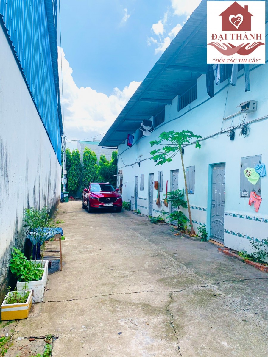 Bán dãy trọ 2 MT ngay chợ trại bò, P.Long Bình. Giá 2 Tỷ 650