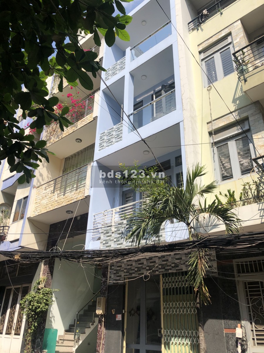 Nhà HXH đường Lê Quang Định: Hầm, Lửng 3 Lầu-Sân Thượng
