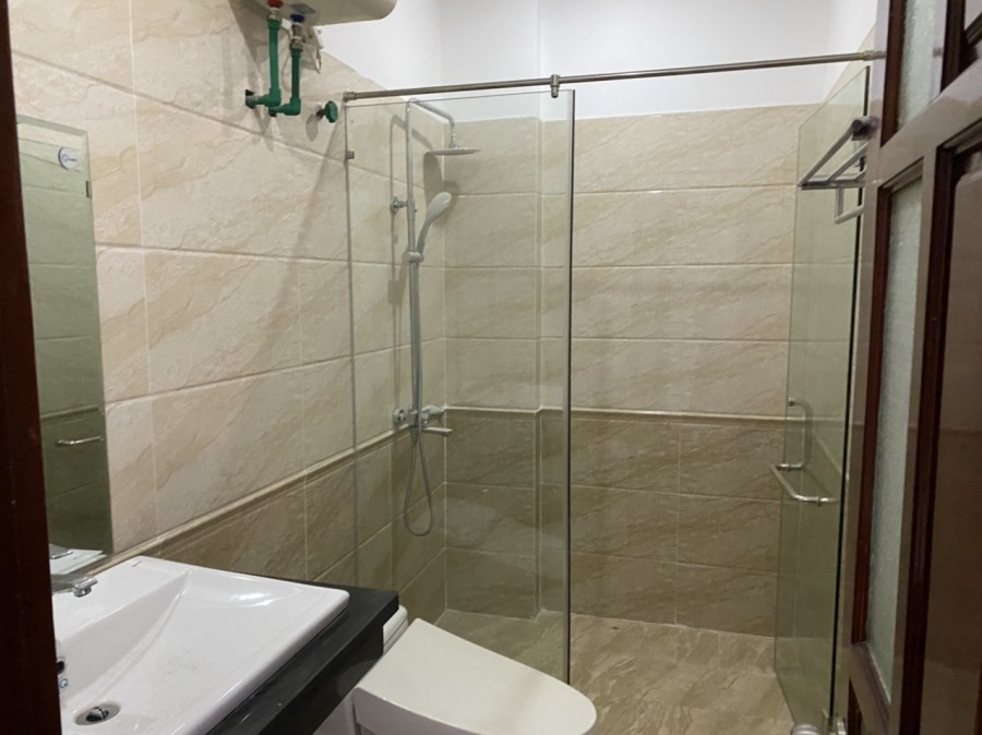 Bán nhà khu phân lô Hoàng Cầu,7 tầng thang máy, dt 65m2, mt 4.6m, giá 16 tỷ