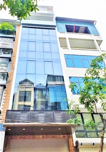 Bán nhà khu phân lô Hoàng Cầu,7 tầng thang máy, dt 65m2, mt 4.6m, giá 16 tỷ
