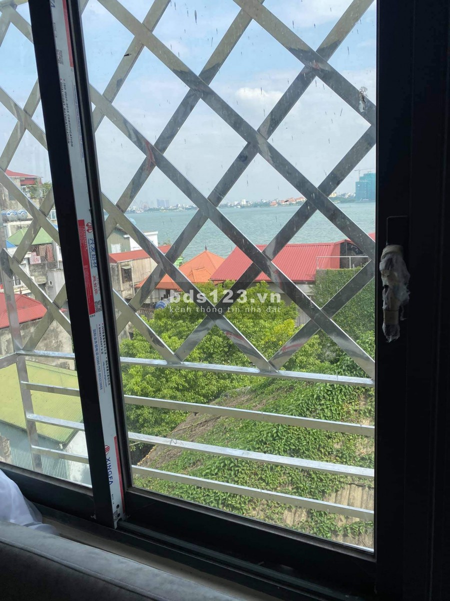 Võng Thị, 121m2X7Tx8.4mMT. 18 phòng. Giá 36 tỷ.