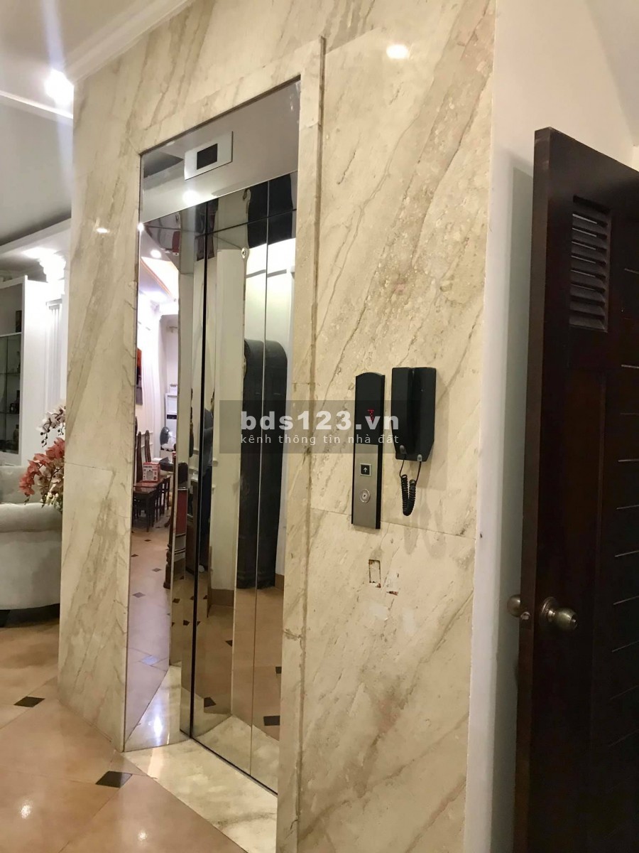 Bán Nhà Nguyễn Khánh Toàn gara ô to 7 tầng thang máy KD dt 65m MT 6m giá 13.5 Tỷ