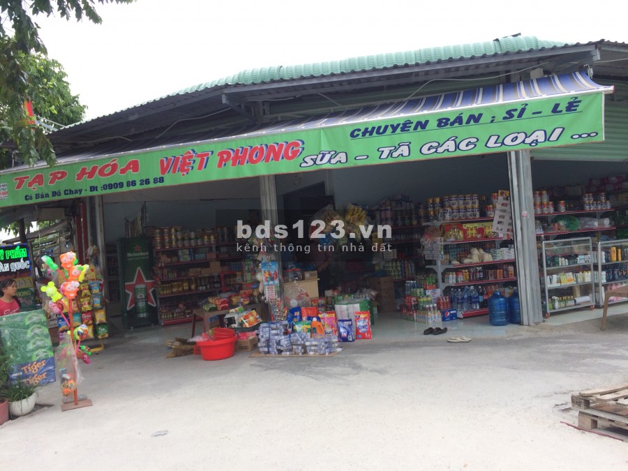 Gia đình tôi có mua 2 mẫu đất đường rộng 16m đối diện KCN cần bán để trả nợ