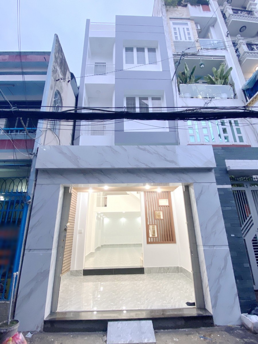 Nhà (4.3*13m, 2 lầu, mái che thang) hẻm VIP Âu Dương Lân P3 Q8