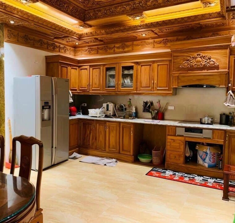 Phân lô Hoàng Cầu, ô tô tránh, kinh doanh gara dt 50m2, mt 4.5m, 5 tầng đúc, giá 13.5 tỷ