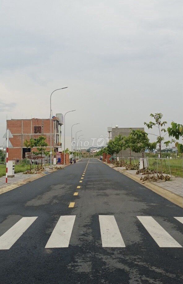Bán gấp lô đất ngay chợ Vĩnh Tân, thổ cư 100%, đường xã rộng rãi