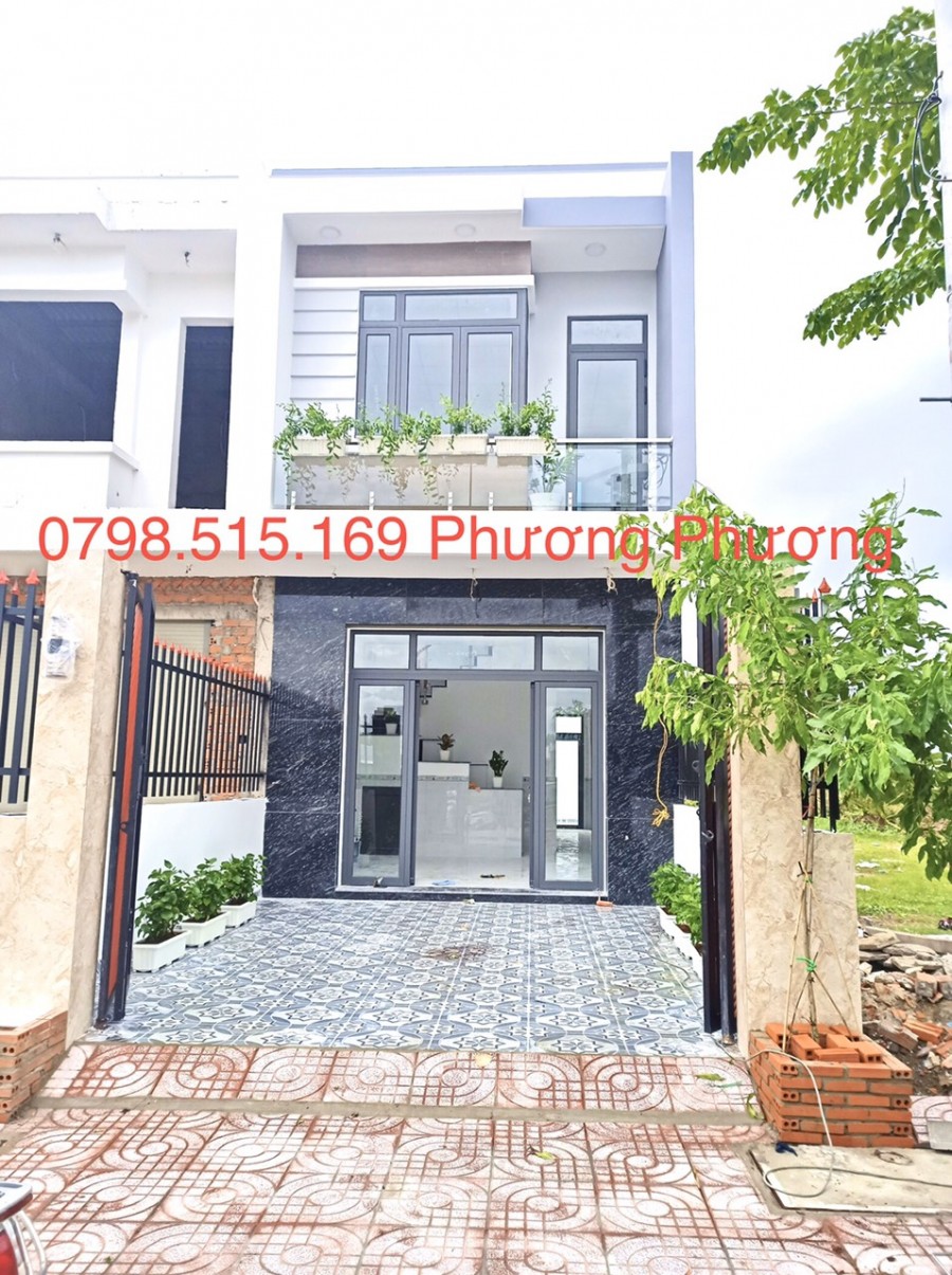 Cần bán nhà 1 trệt 1 lầu 100m2, sổ hồng riêng, nhà đẹp giá công nhân