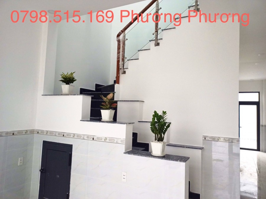 Cần bán nhà 1 trệt 1 lầu 100m2, sổ hồng riêng, nhà đẹp giá công nhân