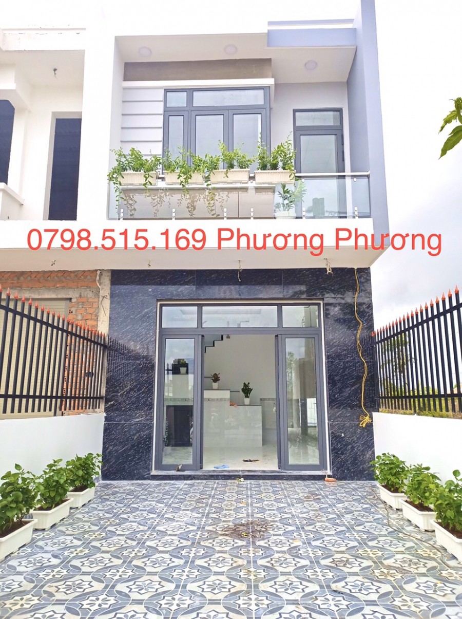 Cần bán nhà 1 trệt 1 lầu 100m2, sổ hồng riêng, nhà đẹp giá công nhân