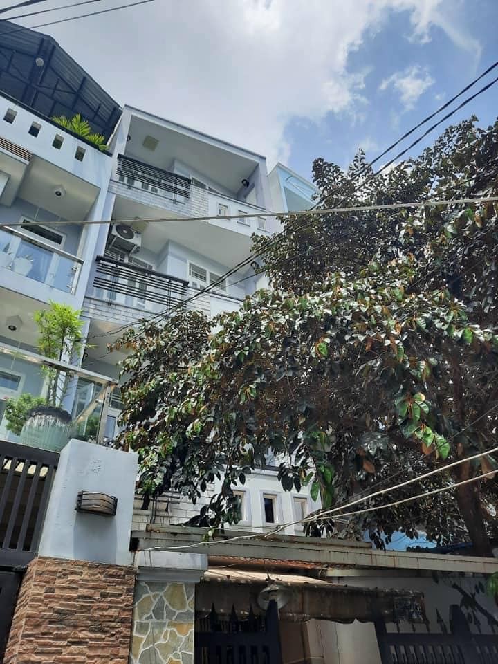 Nhà nguyên căn 4 tầng bê tông cốt thép chắc chắn, 2 mặt hẻm trước sau