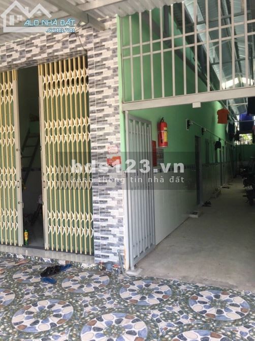 Bán dãy trọ 7 phòng dt 125m2 đất thổ cư, shr, mt 16m, giá 1.9 tỷ, sát bên kcn An Hạ