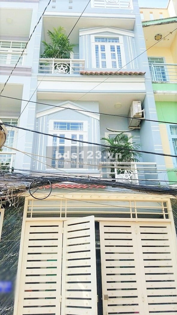 Nhà mới 1T2L, sau căn mặt tiền đường Nguyễn Văn Quá, p.Đông Hưng Thuận, Q12