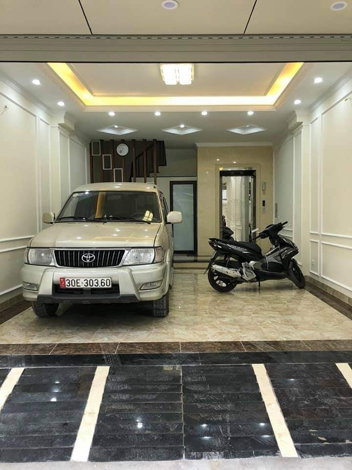 Nhà Lô Góc Thang Máy kinh doanh GaRa Ô Tô 61m, 7 tầng Đống Đa 9.45tỷ