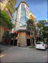 Bán Nhà Vũ Ngọc Phan, Đống Đa Lô Góc MT Rộng 5 Tầng Thang Máy, Kinh Doanh - Gara Ô Tô.