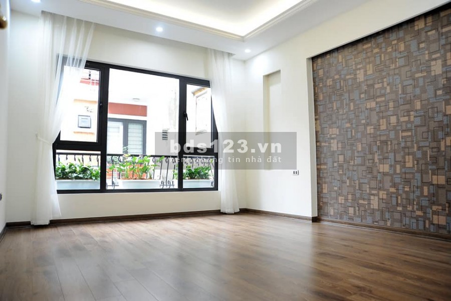 Bán nhà MP Nguyên Hồng, 7 tầng thang máy, vỉa hè 3m oto đỗ cửa, cho thuê 50tr/tháng