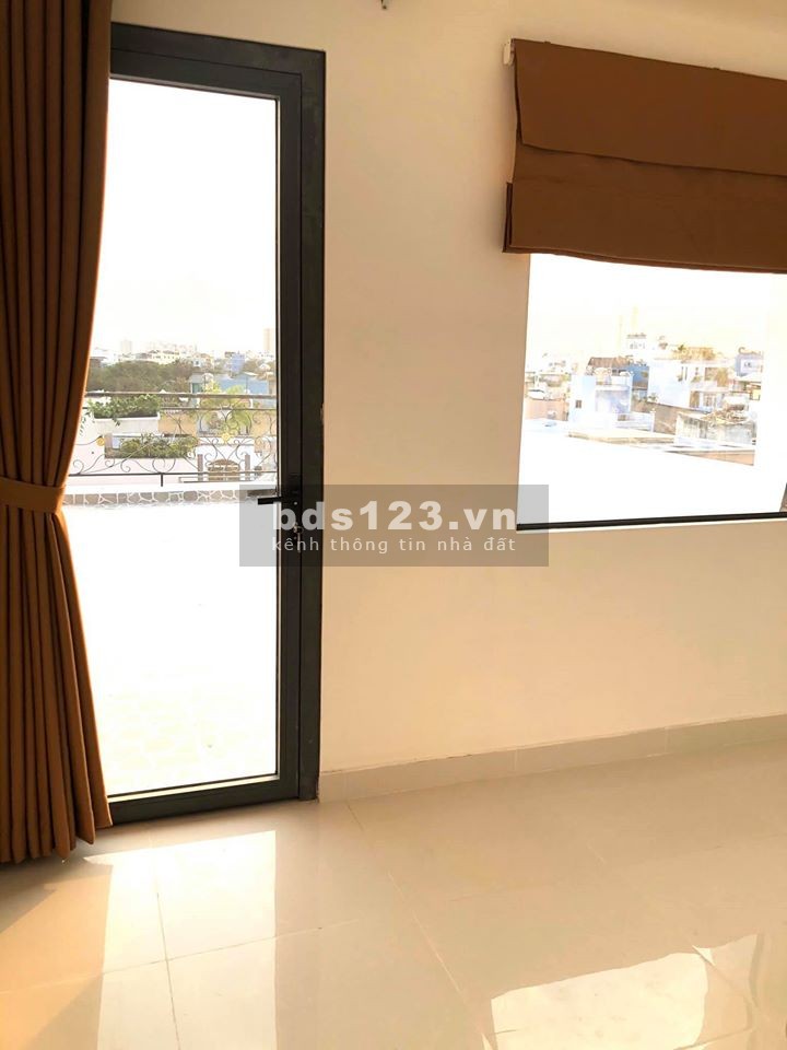 Nhà phố mặt tiền Đất Thánh gần chợ Tân Bình, giá bán 12.4 tỷ, xe ra vào tránh nhau thoải mái