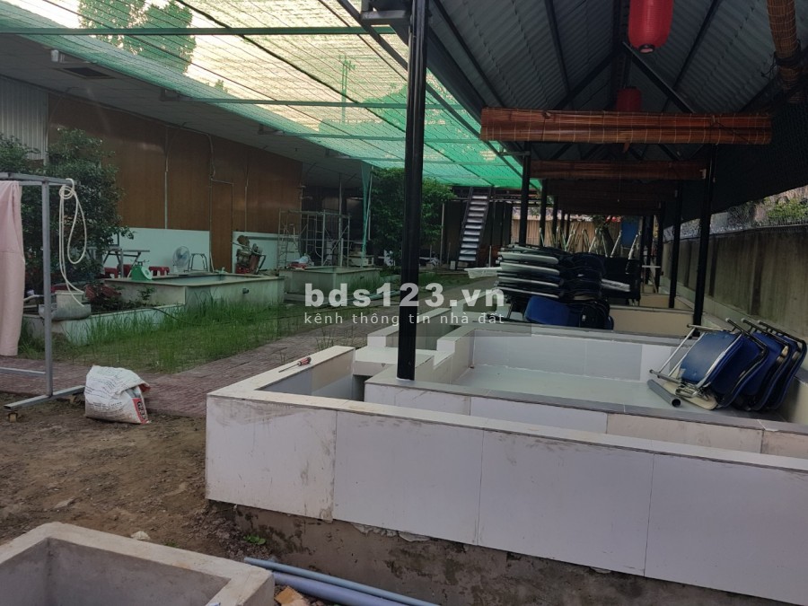 Bán nhà mặt tiền gồm quán cà phê sân vườn và tiệm rửa xe oto rộng 2653m2 tại Trà Vinh