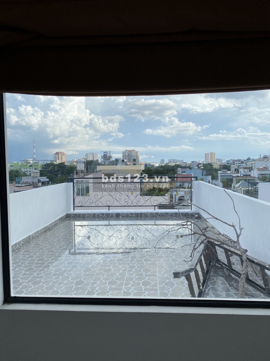 Nhà phố mặt tiền Đất Thánh gần chợ Tân Bình, giá bán 12.4 tỷ, xe ra vào tránh nhau thoải mái