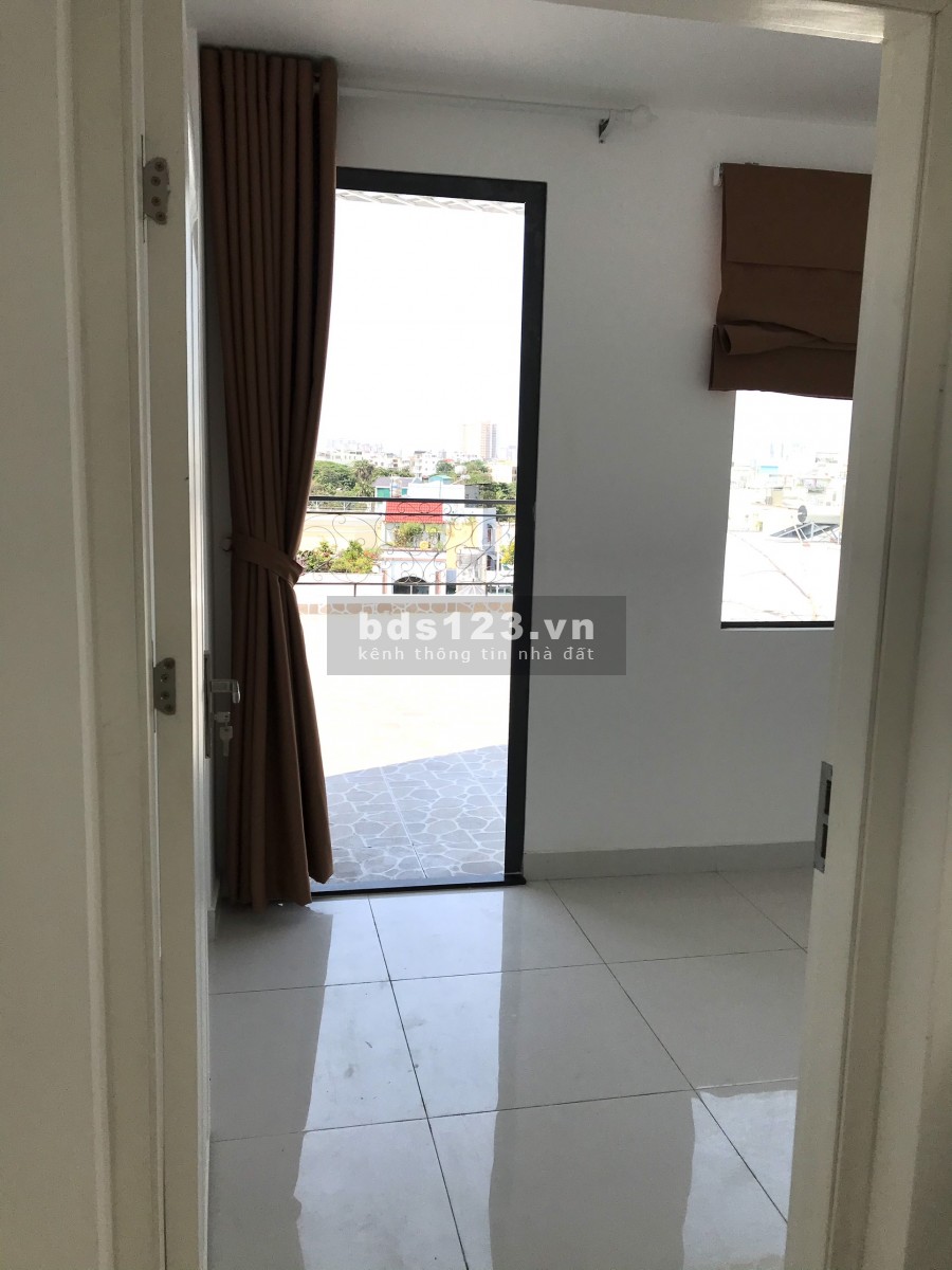 Nhà phố mặt tiền Đất Thánh gần chợ Tân Bình, giá bán 12.4 tỷ, xe ra vào tránh nhau thoải mái