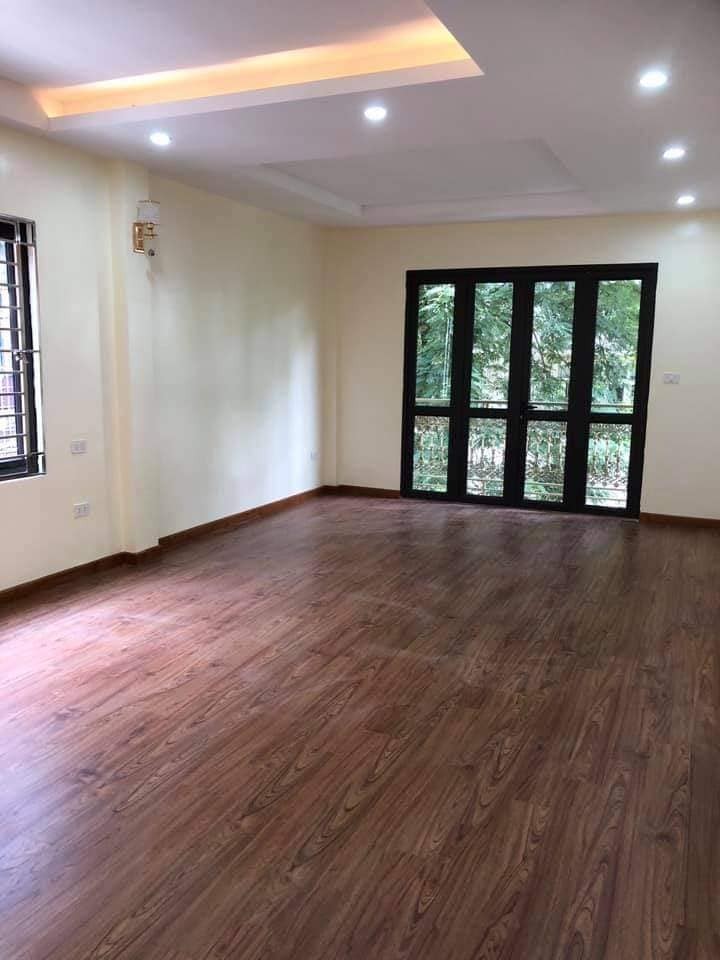 Nhà đẹp Tôn Thất Tùng dt 56m2, 7 tầng thang máy, giá 13,5 tỷ, kinh doanh ngõ oto thông lô góc