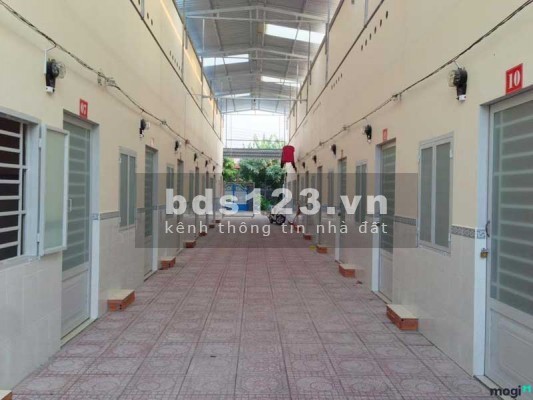 Cần bán dãy trọ 12 phòng trọ dt 125m2, gần chợ chiều đường 12m, sổ hồng riêng