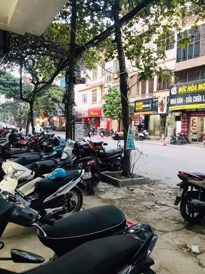 Bán Nhà MP Vọng, HBT, Gara Ôtô, 7 Tầng Thang Máy, Kinh Doanh số 1 TT. Giá 26,5 Tỷ.