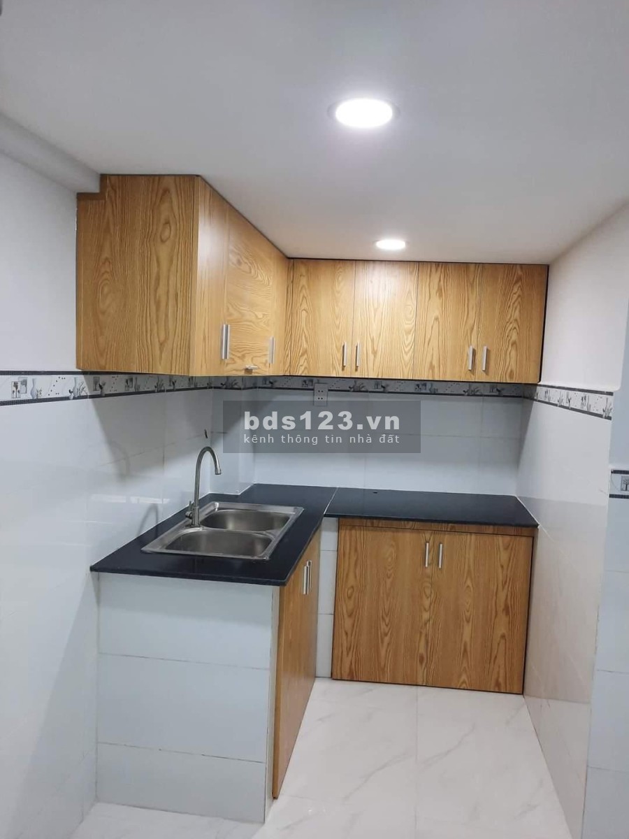 Nhà mới giá rẻ dtsd 60m2 1 trêt 2 lầu sổ hồng riêng, giá bán 2.3 tỷ, đường Lạc Long Quân, Tân Bình