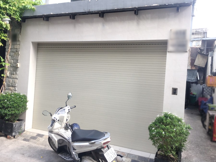 Nhà (4.1*12m, nở hậu) căn góc hẻm xe hơi Âu Dương Lân Quận 8 đúc kiên cố, sổ hồng