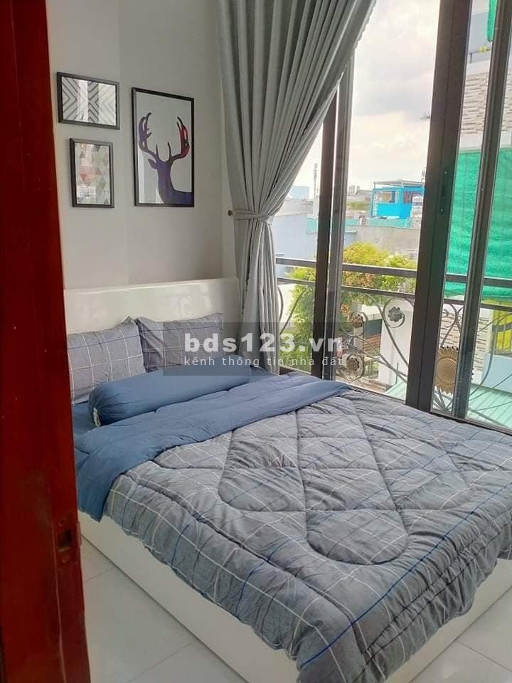 Nhà 1 sec Nguyễn Văn Quá, hẻm thông, xe hơi đi được, 2 lầu giá 2,76 tỷ bớt lộc, lhcc