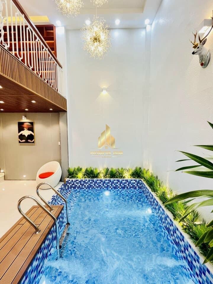 Bán nhà Phạm Văn Chiêu Gò Vấp DT 1 trệt 4 lầu dt 8.6.6 4pn 4wc hồ bơi giá 7.3 tỷ lhcc