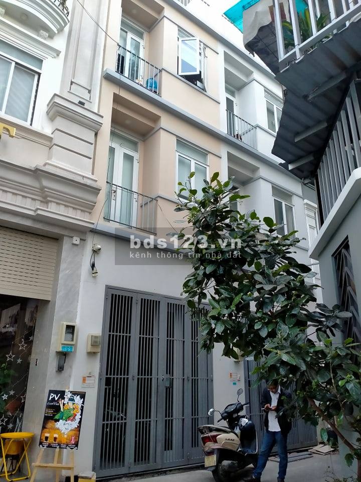 Bán nhà HXH Phạm Văn Đồng P13 Bình Thạnh 99m2 4 tầng BTCT, giá 11.2 tỷ.