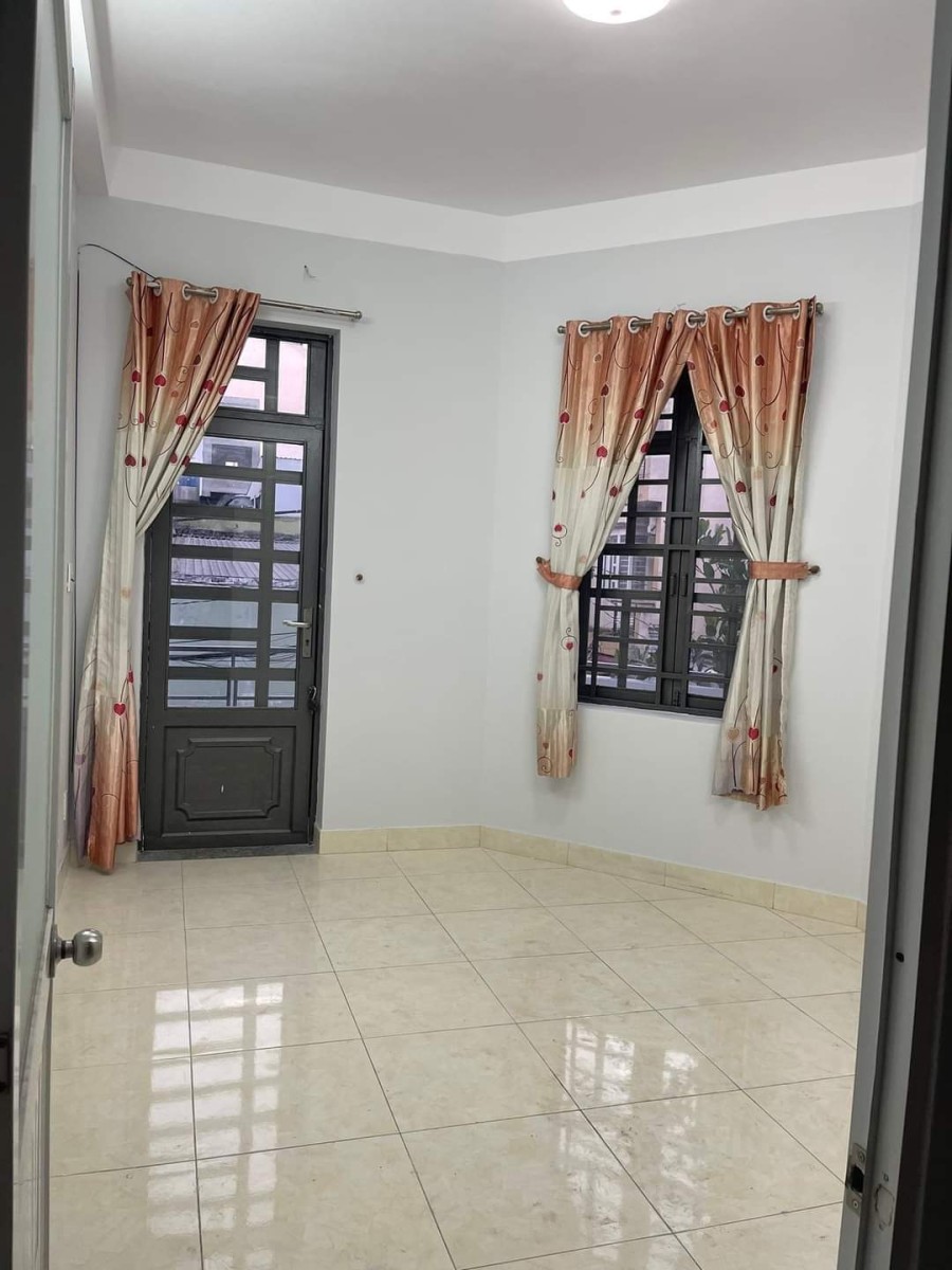 Nhà 4 tâng Lê Văn Quới Quận Bình Tân hẻm xe hơi diện tích sử dụng 4,2x10