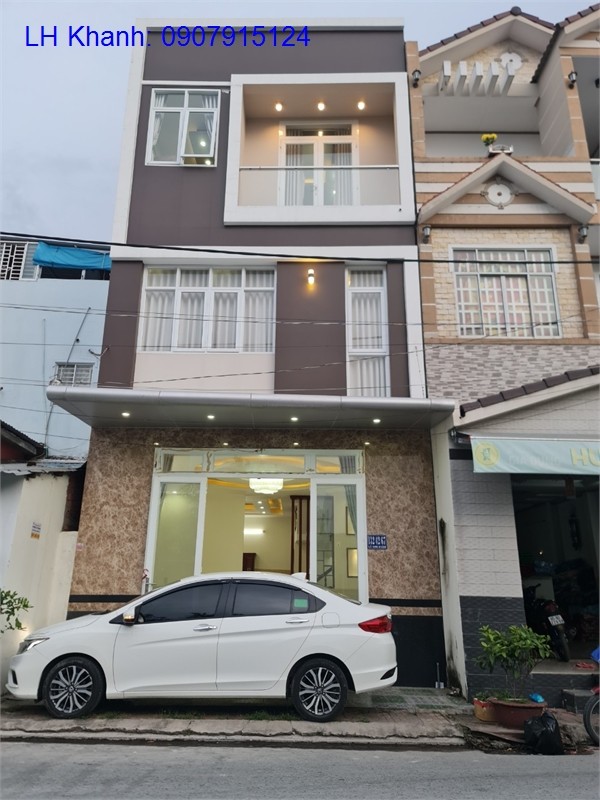 Nhà mới 2 lầu 2 mặt tiền đường Lê Anh Xuân ô tô có Nơi đậu ô tô, lh 0969630052