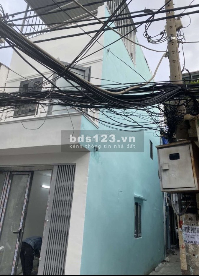Bán nhà 2 lầu hẻm 122 Tôn Đản Quận 4 hẻm thông xe hơi 4m lh 0937423033