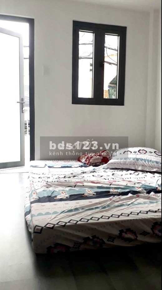 Bán nhà 2 lầu hẻm 122 Tôn Đản Quận 4 hẻm thông xe hơi 4m lh 0937423033