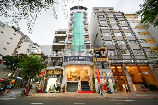 Bán khách sạn 12 Tầng MT Lê Thánh Tôn, Bến Thành, Quận 1 bán 230 tỷ lh Quân 0911.989.098