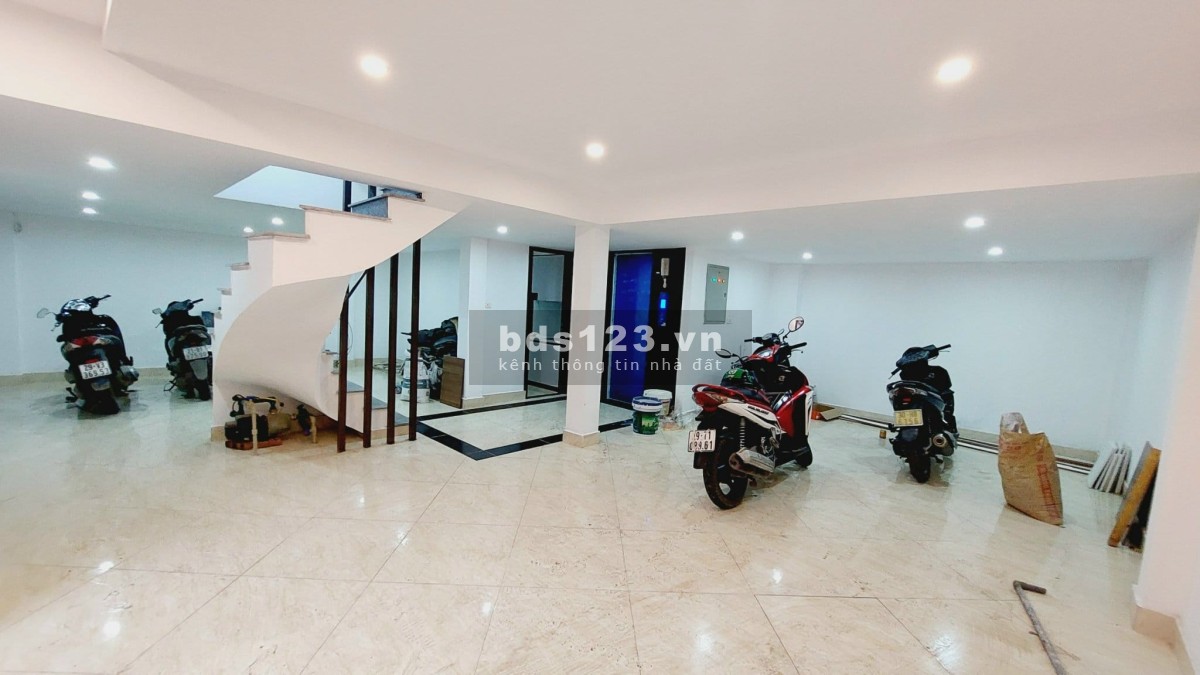 Nhà đẹp mặt ngõ Cầu Giấy - Ô tô chờ thang máy mặt tiền rộng 10M kinh doanh tốt 52M, 4 tầng