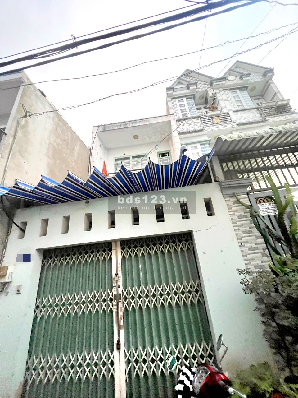 Nhà hẻm Tân Thới Hiệp 06 quận 12, 4x14m, trệt, lửng, 1 lầu. Giá 3.050 tỷ, hẻm thông, 3PN