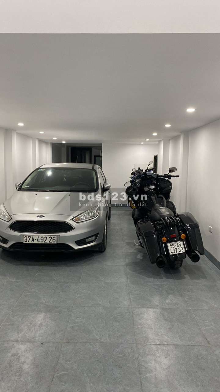 Bán nhà Chùa Láng, oto vào nhà, 61m x 7 tầng thang máy, kinh doanh văn phòng, giảm giá còn 15,3 tỷ