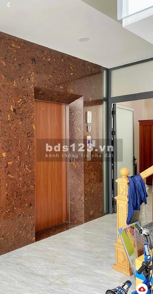 BÁN GẤP NHÀ 5 TẦNG, CÓ THANG MÁY, MT 5M, GIÁ 9,5Tỷ, HẺM XE TẢI, GẦN NGUYỄN THỊ ĐỊNH, QUẬN 2, HCM.