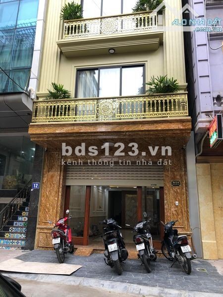Bán nhà Thái Hà 8 tầng ô chờ thang máy ngõ thông kinh doanh ô tô tránh 62m2 16.5 tỷ